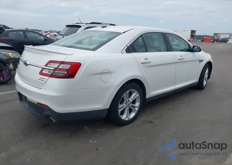 2015 Ford Taurus Sel z USA, uszkodzony, nr VIN 1FAHP2E80FG133002